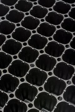 Black plastic pattern abstract squares background plastic Foto stock