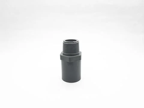 Black plastic pipe fitting adapter isolated on a clean white background Stock Photos