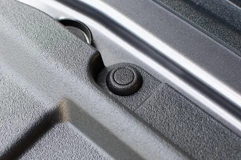 Black plastic push pin rivet fastener Stock Photos