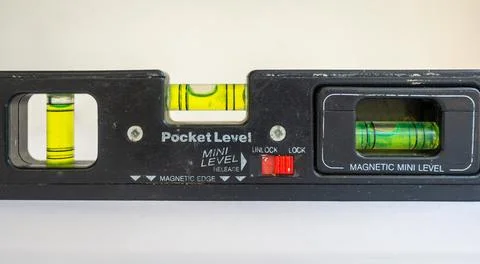 Black plastic spirit level construction building tool. Isolated white background 写真素材