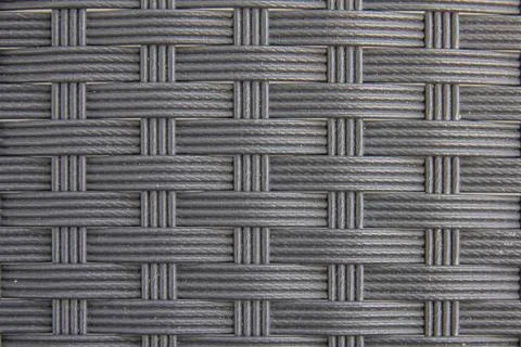 Black plastic woven with patterns. Stock Photos