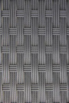 Black plastic woven with patterns. Stock Photos