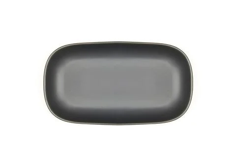 Black plate on white background Stock Photos