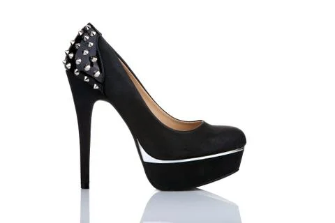 Black platform shoe with studs, isolated on white Foto stock