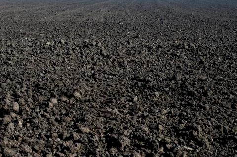 The black plowed field in the fall Stock Photos