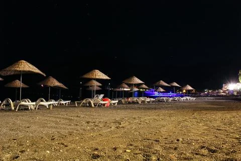 A black poolside at night Foto stock