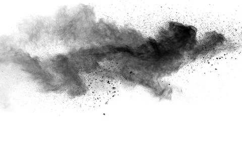 Black powder explosion on white background. Stock Photos