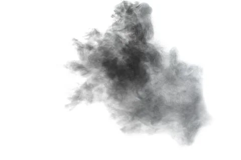Black powder explosion on white background. Abstract black dust splattered. Stock Photos