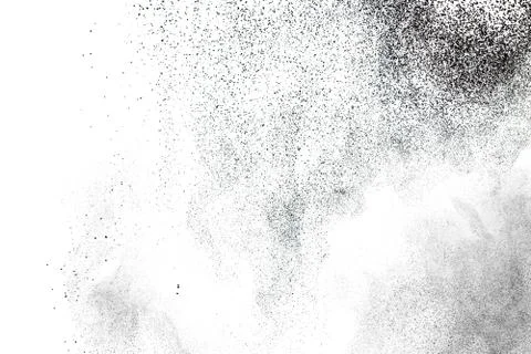 Black powder splatter background.Dust particles texture. Stock Photos