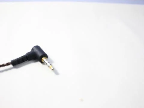 Black power cable with plug isolated on white background Stock Photos