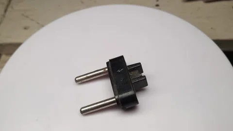 Black power plug isolated on a white background Video stock 255518973