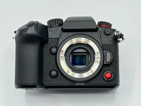 Black Professional Camera on White Background Stockfoto's