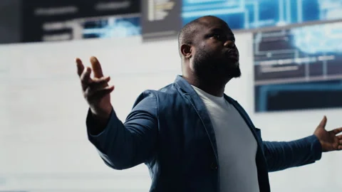 Black professional software engineer programming for tech innovation Stock Footage 312304178