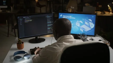Black Programmer Developing Cybersecurity Software at Night Stock Footage 348143774