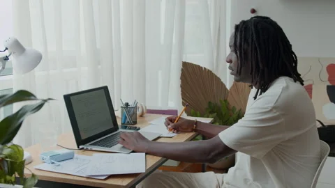 Black Programmer Examining App Mockup Using Laptop at Home Office Stock-Footage 300824288