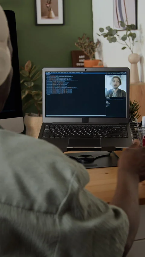 Black Programmer Having Video Call on Laptop in Home Office Stock-Footage 347660265