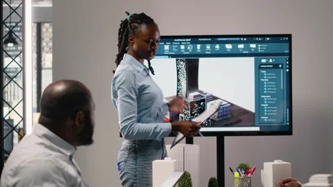 Black property developer discussing residential project investment Stock Footage 316643338