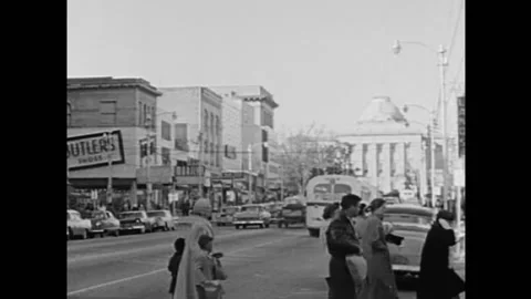Black protestors peacefully protest at a Woolworth and are arrested in 1960. Stock Footage 152665654