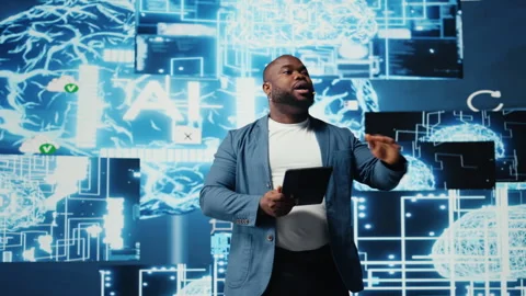 Black public speaker host presenting AI neural networks at live event Stock Footage 312360344
