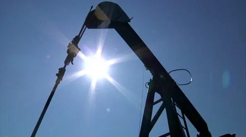 Black Pumping Unit with Sun Flair Stock-Footage 44266921