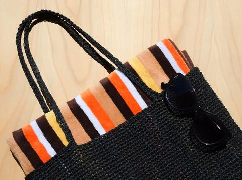 Black raffia beach bag. Stock Photos