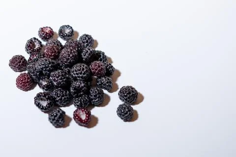 Black raspberry is fragrant and delicious on a white background. Foto stock