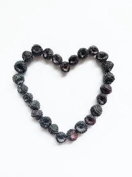 Black raspberry heart. Stock Photos
