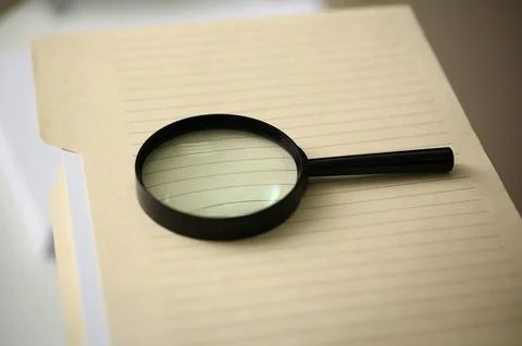 The black reading lens is on the Stock Photos