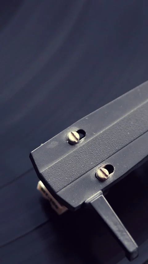 Black Record Player Needle And Spinning Disc Close Up. Vertical. Stock Footage 297862679