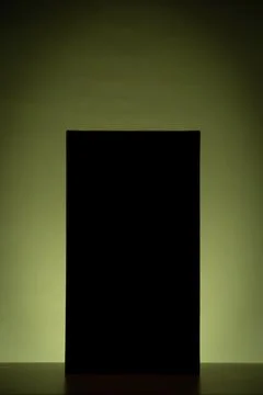 Black rectangle with green gradient background lighting 库存照片