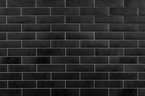 Black Rectangular Tiles Wall Background with Grid Pattern. A detailed view of a Foto stock