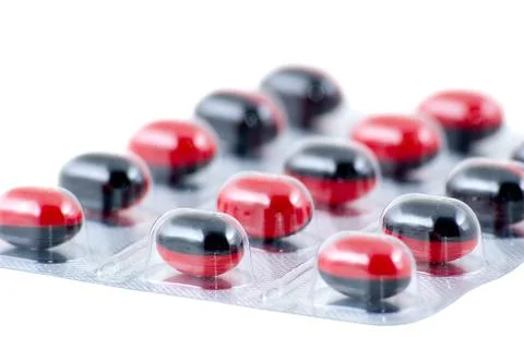 	Black-red pills Stock Photos