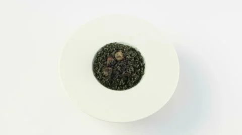 Black rice dish rotating Stock Footage 56140180