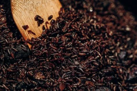 Black rice is mixed. Close-up. Selective focus Stock-Fotos