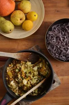 Black rice noodles with stir fried vegetables Stock Photos
