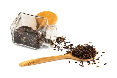 Black rice in spoon Stock Photos