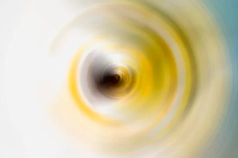 The black ripple effect in the yellow-colored solid background. Stock Photos