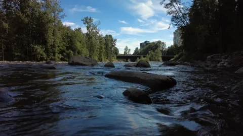 Black River Cutting Through City Stock Footage 201426260