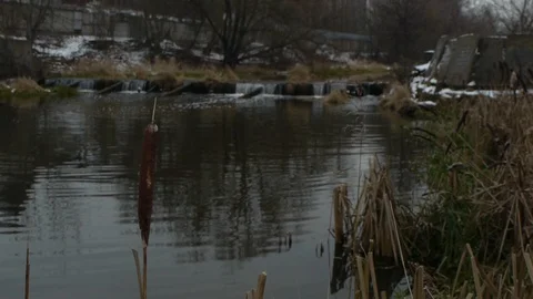 Black river, winter dam Stock Footage 122840495