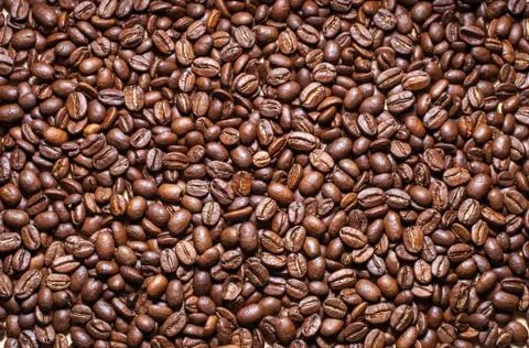 Black roasted coffee beans abstract pattern Stock Photos