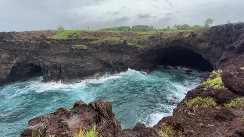 Black rock cliff on the sea in Easter Island Stock Footage 342842230