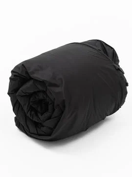 Black rolled item plain studio shot Stock Photos