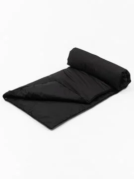 Black rolled sleeping bag variant five Stock Photos