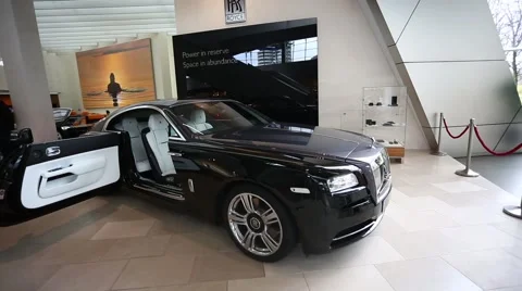 Black Rolls Royce on the exibition Stock Footage 61537619