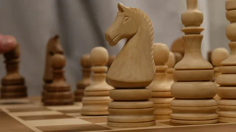 Black rook attacks white knight Stock Footage 146942185