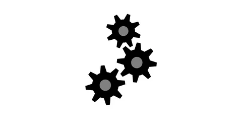 Black rotating gears of different sizes on white background 4K Stock-Footage 119493220