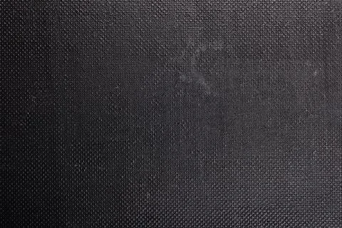 Black rough plastic surface with regular artificial pimply bumps Stock Photos