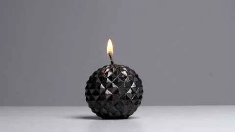 Black round candle Stock Footage 132862145