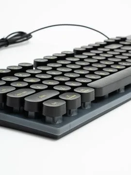 Black round keycap keyboard side view Stock Photos