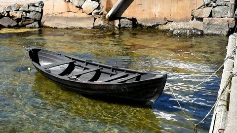 Black rowboat Stock Footage 91250522